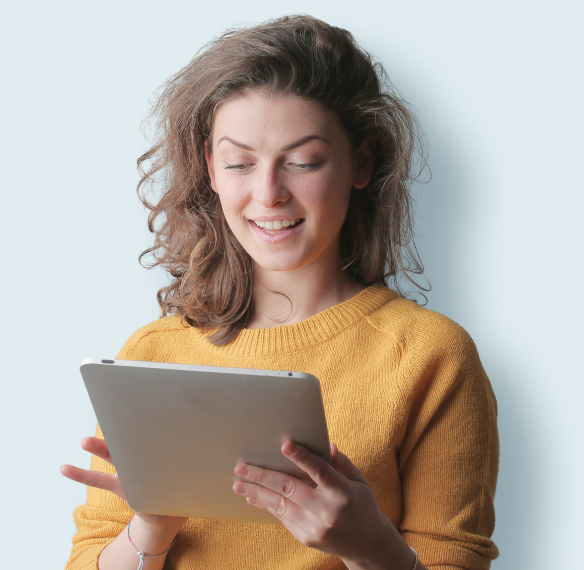 Woman Working on Tablet